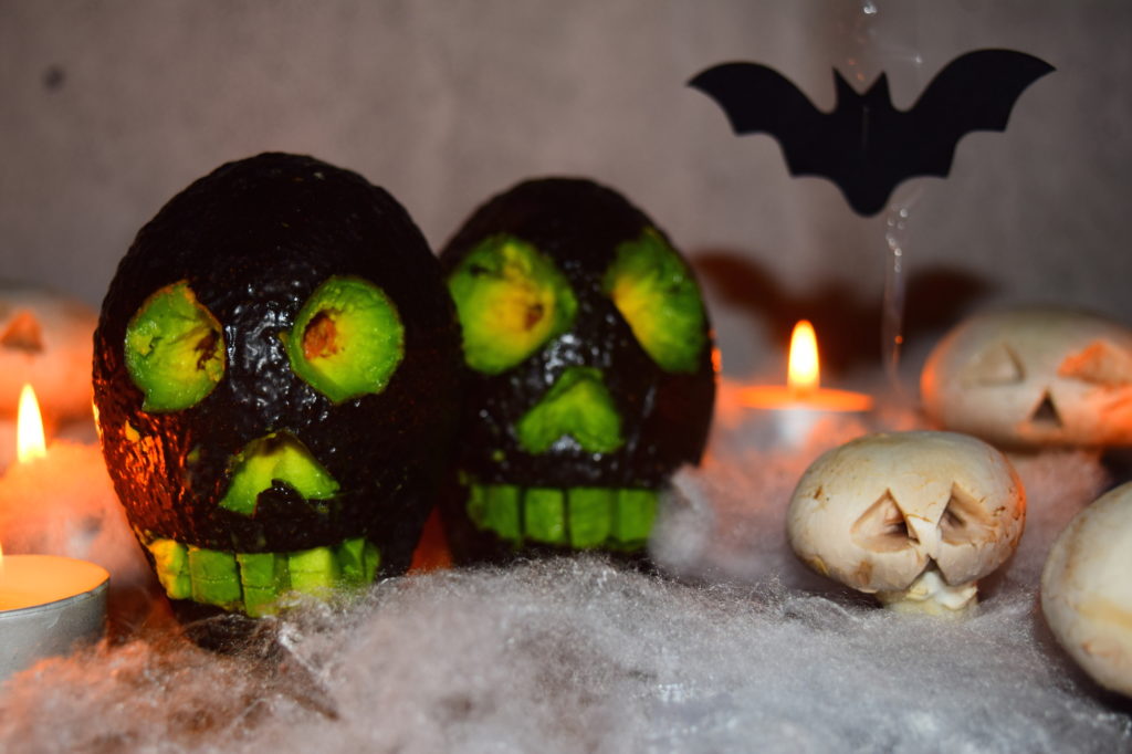 Fun, easy and spooky halloween food art ideas for kids from MyNutriCounter - Avocado skulls and mushroom ghosts